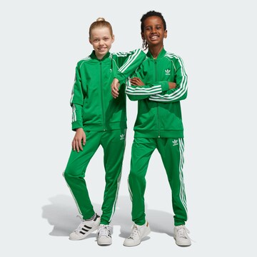 ADIDAS ORIGINALS Tapered Pants 'Adicolor Sst' in Green