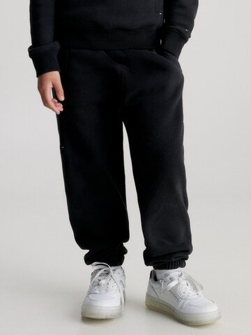 Calvin Klein Jeans Tapered Pants in Black: front