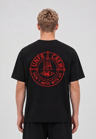 T-Shirt 'DMWU' Unfair Athletics en noir : devant