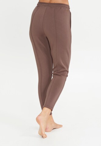 Athlecia Skinny Hose 'Jacey' in Braun