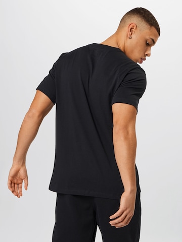 Nike Sportswear T-Shirt 'Swoosh' in Schwarz