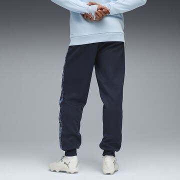 PUMA Tapered Sportbroek 'Manchester City King Anthem' in Blauw