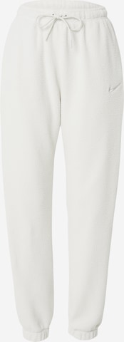 Nike Sportswear Tapered Pants in Beige: front