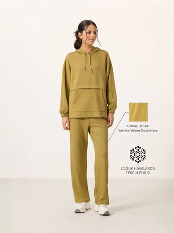 Tommy Life Trenirka za tek | zelena barva: sprednja stran