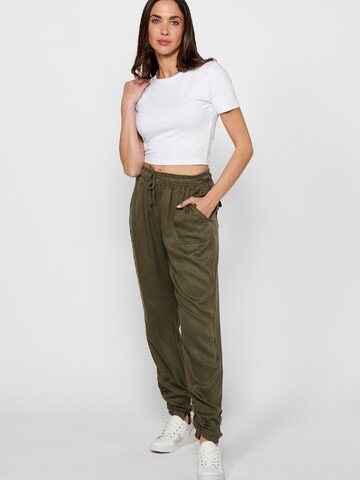 KOROSHI Loose fit Sports trousers in Green
