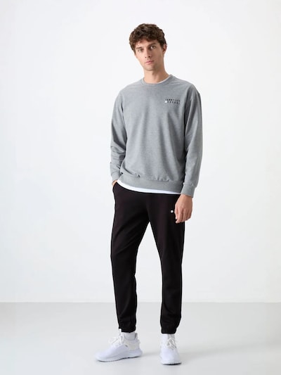 Tommy Life Survêtement en L en gris clair, Vue avec produit