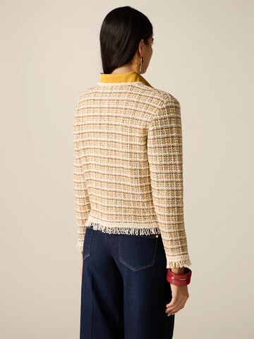 Cardigan oltre en beige