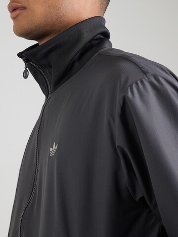 ADIDAS ORIGINALS Tussenjas in Zwart
