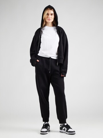 Tapered Pantaloni 'TRAIN VISIBILITY' di EA7 Emporio Armani in nero