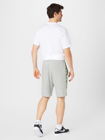Nike Sportswear Normální Kalhoty – šedá