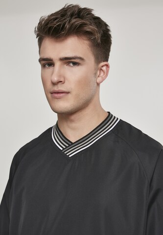 Coupe regular Veste mi-saison Urban Classics en noir