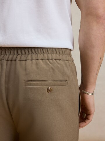 DAN FOX APPAREL Normalny krój Spodnie 'Gregor' w kolorze brązowy