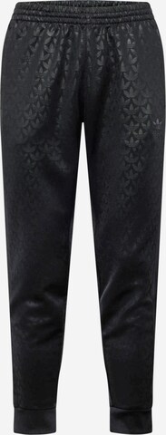 ADIDAS ORIGINALS Tapered Pants 'Graphics Monogram Sst' in Black: front