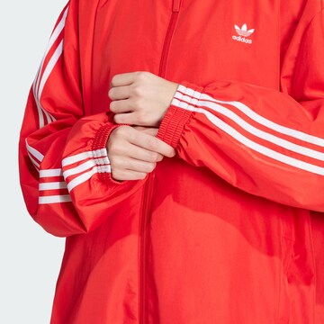 ADIDAS ORIGINALS Between-season jacket 'Adilenium Season 3' in Red