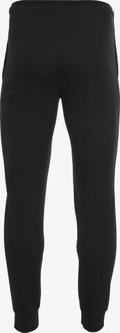 Champion Authentic Athletic Apparel Tapered Pants in Black