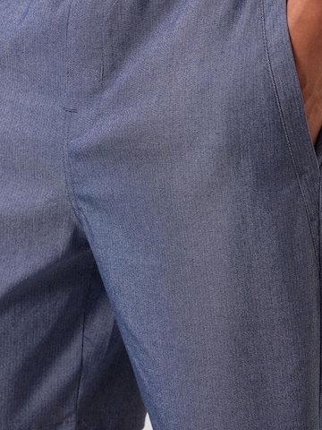 Tommy Life - Perna larga Calças chino em azul