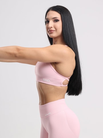 neverover Korzetová Sportovní podprsenka 'Hue Cross-Back Strappy Bra' – pink