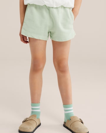 WE Fashion - Loosefit Calças em verde: frente