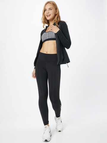 NIKE Skinny Sportsbukse i svart