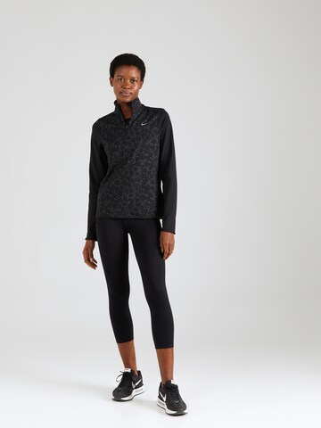 NIKE Skinny Sportbroek in Zwart