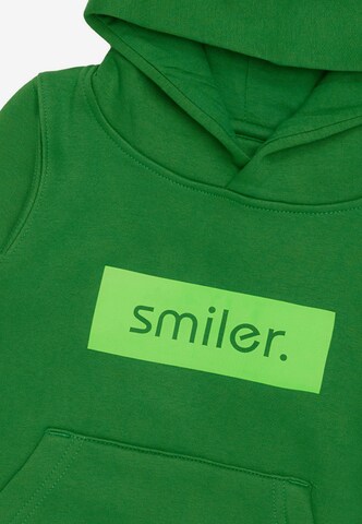 Sweat smiler. en vert