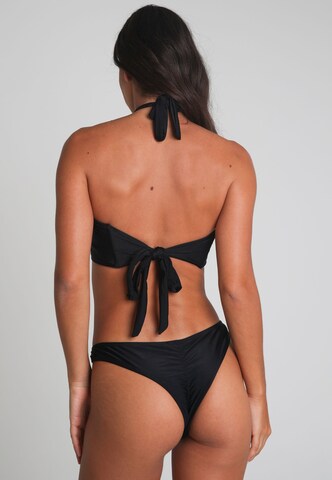 Moda Minx Bikini bottom 'Irregular Hoop' in Black