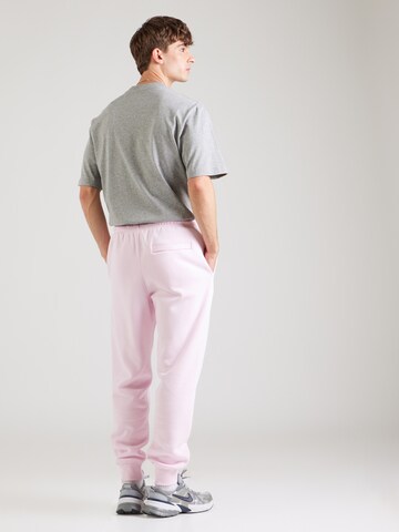 Nike Sportswear Tapered Trousers 'CLUB' in Pink