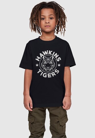 ABSOLUTE CULT T-Shirt 'Stranger Things - Hawkins Tiger' in Schwarz: Vorderseite