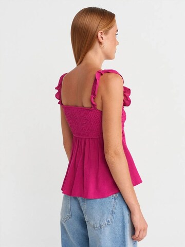 Haut Dilvin en rose