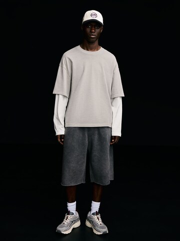 Bershka Loosefit Byxa i svart