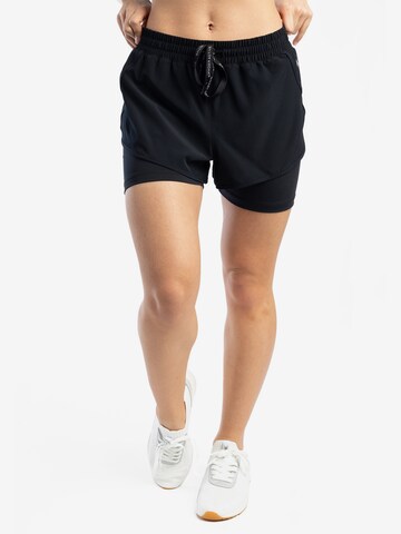 Regular Pantaloni sport de la Spyder pe negru: față