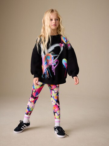 Next - Conjunto en negro: frente