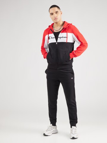 Tuta da jogging di Champion Authentic Athletic Apparel in rosso: frontale