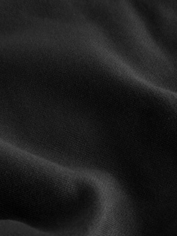 juoda Next Siaurėjantis Kelnės