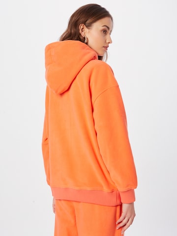 Tommy Jeans - Sudadera en naranja