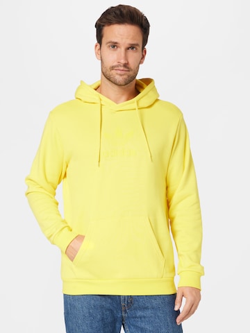 ADIDAS ORIGINALSSweater majica 'Trefoil Series Street' - žuta boja: prednji dio