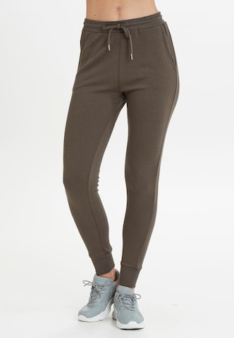 Athlecia Loose fit Workout Pants 'NIARY' in Green: front