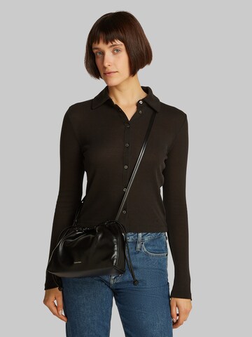 Calvin Klein Jeans Beuteltasche in Schwarz