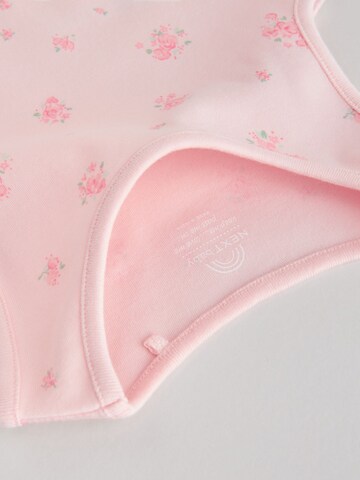 Next - Pijama entero/body en rosa