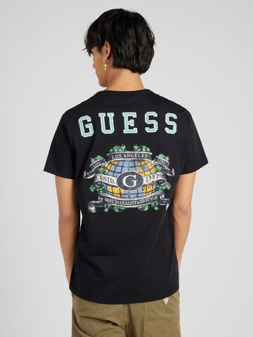 GUESS قميص بلون أسود