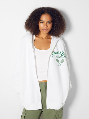 Bershka Zip-Up Hoodie in White: front