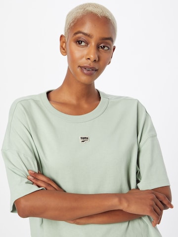 PUMA - Camiseta funcional 'PUMAxABOUT YOU' en verde