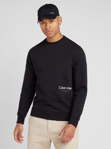 Calvin KleinSweater majica 'OFF PLACEMENT' - crna boja: prednji dio