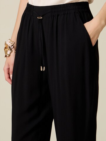 oltre Loosefit Broek in Zwart