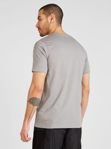 new balance - Camisa funcionais 'Essentials' em cinzento