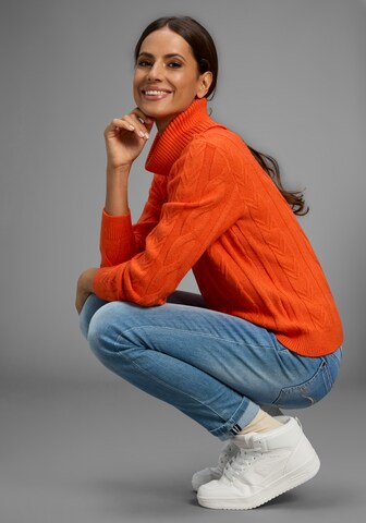 KangaROOS Sweater in Orange
