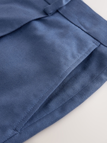 Next Loose fit Pleat-front trousers in Blue