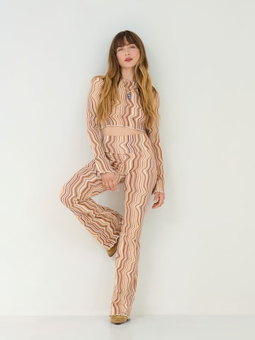 ABOUT YOU x Sofia Tsakiridou Flared Hose 'LOU' in Beige