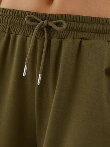 Wide leg Pantaloni sportivi di Hiccup in verde