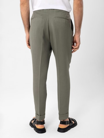 Antioch Regular Trousers with creases in Green